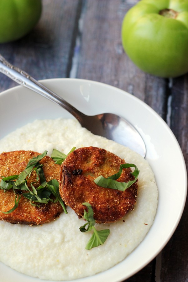 Fried green tomatoes over basil-goat cheese grits