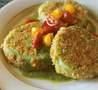 Fried green tomatoes with arugula pesto and cherry tomato relish