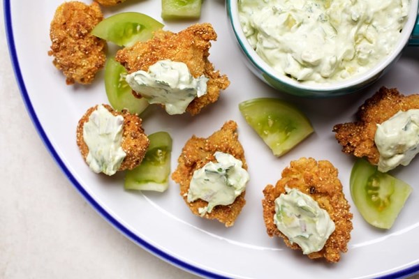 Fried green tomatoes with avocado and sour cream