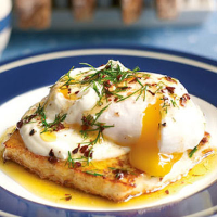 Fried halloumi with garlic yogurt, dill chilli butter and a poached duck egg