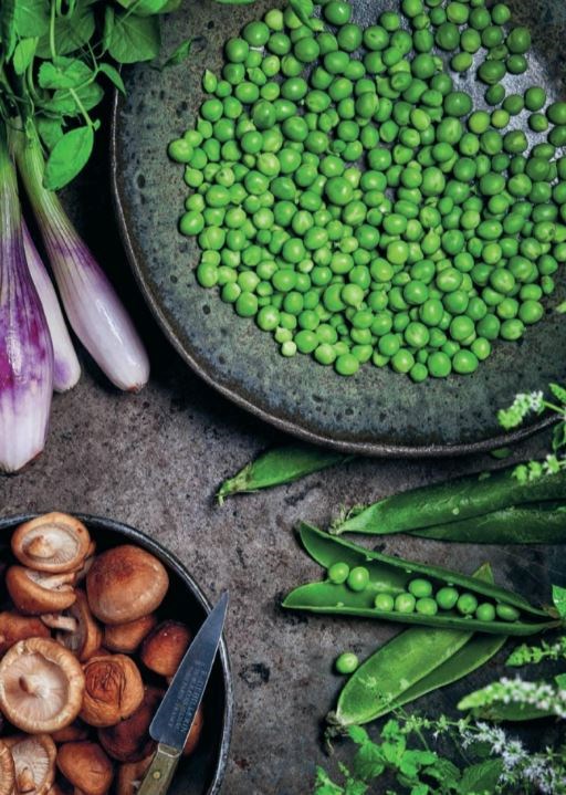 Fried, marinated shiitake mushrooms with green peas and shallots
