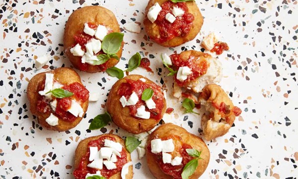 Fried mini pizzas with tomato and mozzarella