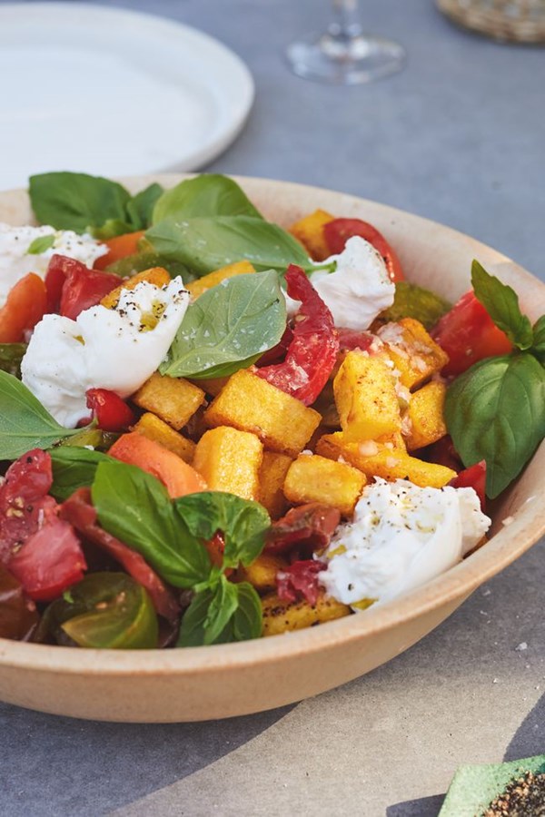 Fried polenta panzanella with tomato, basil and burrata