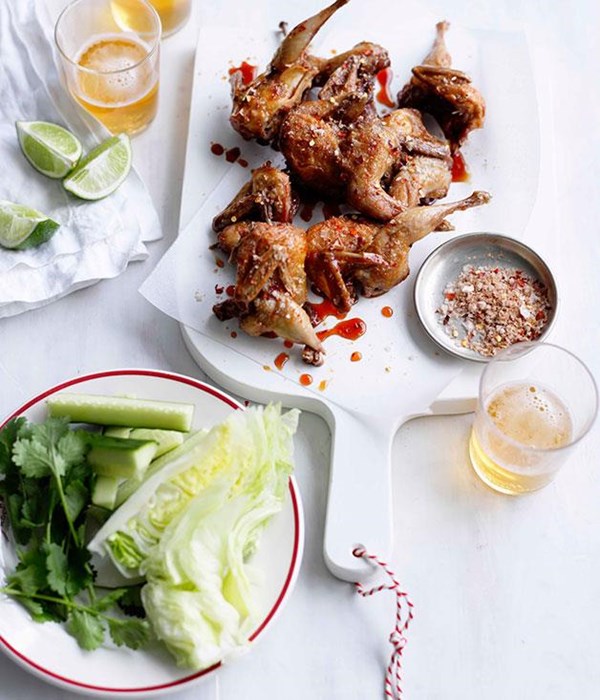 Fried quail with cucumber and lettuce wedges