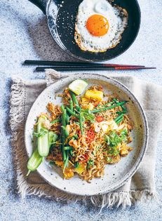Fried rice with crispy fried egg (Nasi goreng)