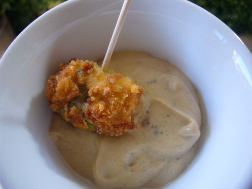 Fried stuffed olives with black garlic aioli