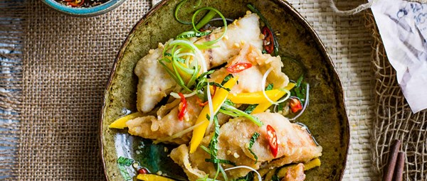 Fried tilapia with shredded mango