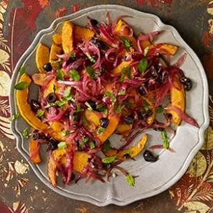 Fried winter squash with black olives