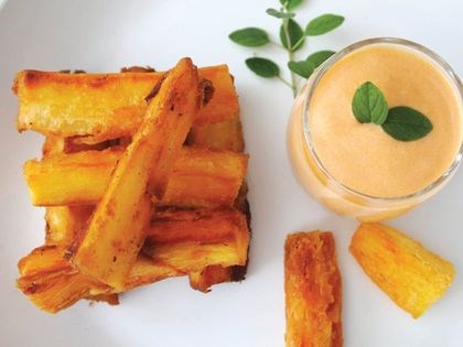 Fried yucca sticks with fiery rocoto sauce