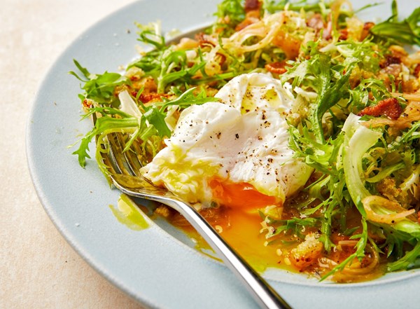 Frisée salad with bacon and poached eggs