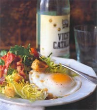 Frisée salad with lardons and poached egg