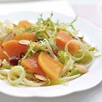 Frisée salad with persimmons, dates, and almonds