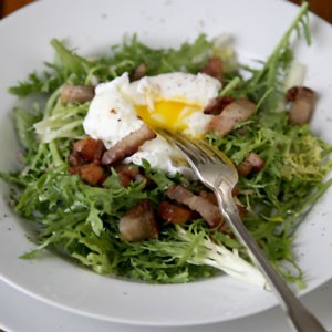 Frisée salad with poached eggs and bacon (Frisée aux lardons)