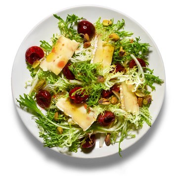 Frisée with pickled cherries, pistachios, and Brie