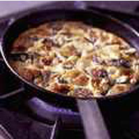 Frittata of home-dried tomatoes, artichoke hearts, Gruyère and basil