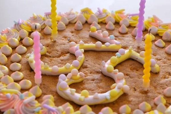 Frosted peanut butter chocolate chip celebration cookie