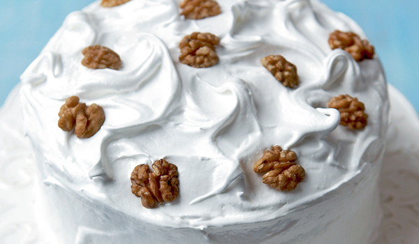 Frosted walnut layer cake