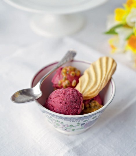 Frozen berry yogurt with passion fruit topping