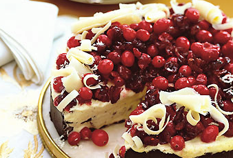 Frozen Grand Marnier torte with dark chocolate crust and spiced cranberries