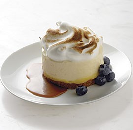 Frozen lemon cream cakes with toasted meringue and caramel sauce
