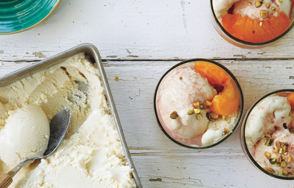 Frozen yogurt with poached peaches
