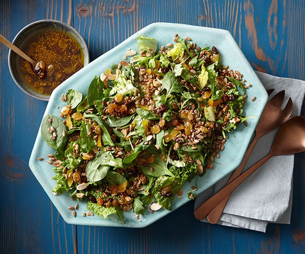 Fruit and nut salad with mixed greens and pickled raisins