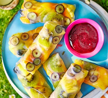 Fruit rice paper rolls with coulis dip