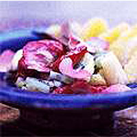 Fruit salad with rose and cinnamon syrup