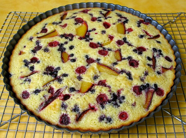 Fruit-studded madeleine cake