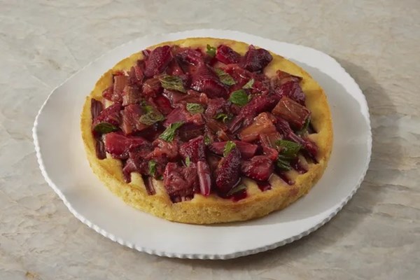 Fruity almond cake with rhubarb, strawberries & mint [Ava Chambers]