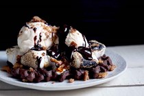 Fudge waffles with ice cream and chocolate sauce