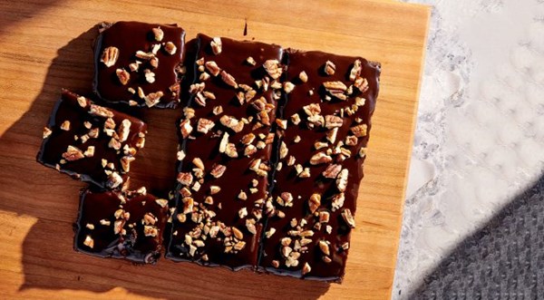 Fudgy brownies topped with ganache [Khela Brewer]