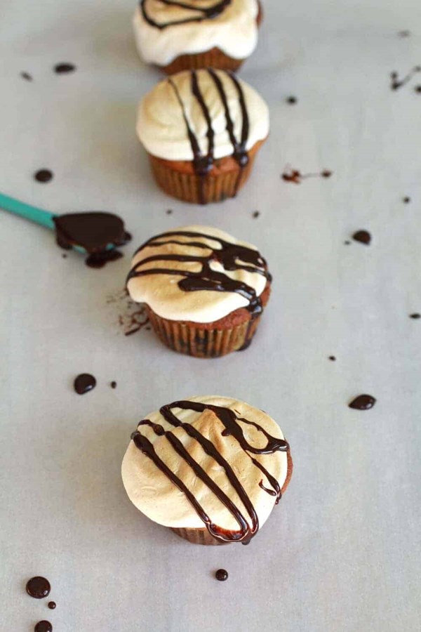 Fugdy brownie stuffed banana cupcakes with toasted marshmallow frosting