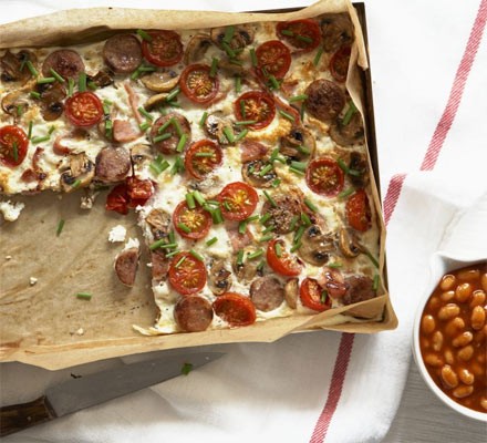 Full English frittata served with spicy beans