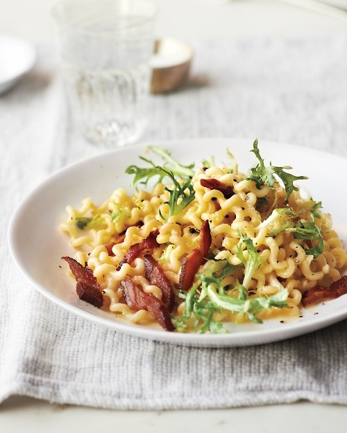 Fusilli carbonara with frisée and lemon