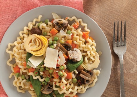 Fusilli col buco with braised spring vegetables