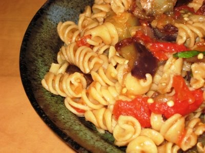 Fusilli with eggplant, pine nuts, capers, and raisins