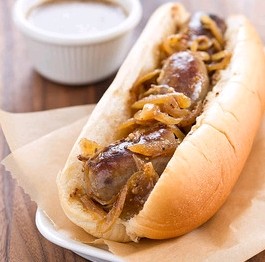 Game-day beer brats with onion and mustard