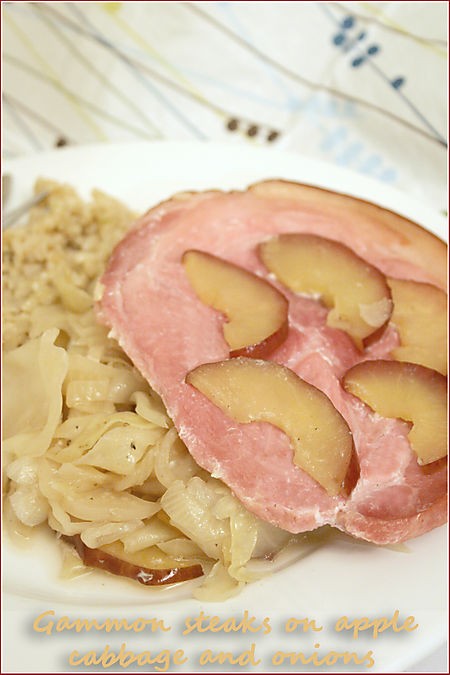Gammon steaks on cabbage, apple and onion