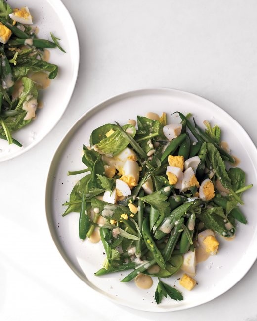Garden greens with chopped eggs and whole herbs
