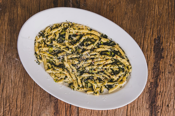 Garden herbs and garlic butter with busiate