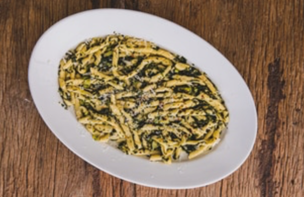 Garden herbs and garlic butter with busiate