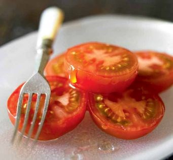 Garden ripe tomatoes drizzled with honey (Kkool tomato)