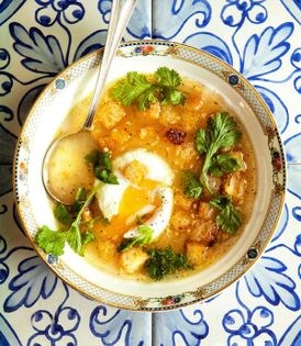 Garlic and cilantro soup with poached eggs and croutons (Açorda alantejana)