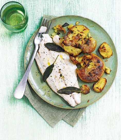 Garlic and sage smashed Jersey Royals with pan-fried sea bass