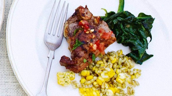 Garlic and thyme lamb chops with corn and pearl barley salad and wilted spinach