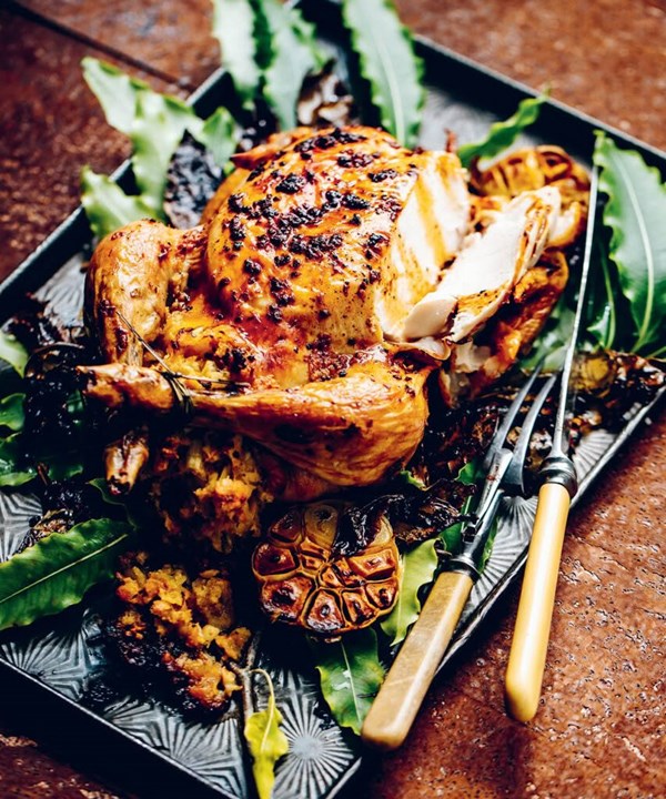 Garlic butter-roast chicken with lemon thyme stuffing
