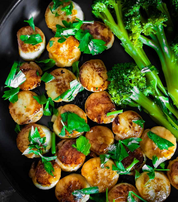 Garlic butter scallops with broccolini