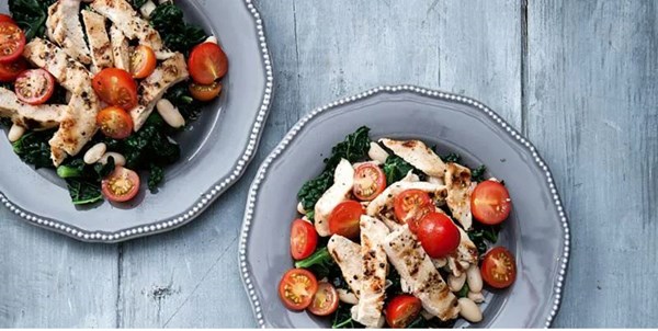 Garlic chicken with beans, kale and cherry tomatoes