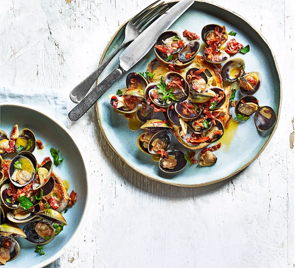 Garlic chilli clams on sourdough toast